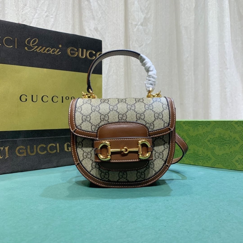G*u*i top handle bags